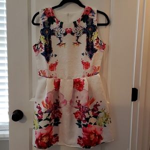 White and floral sleeveless size small/med dress